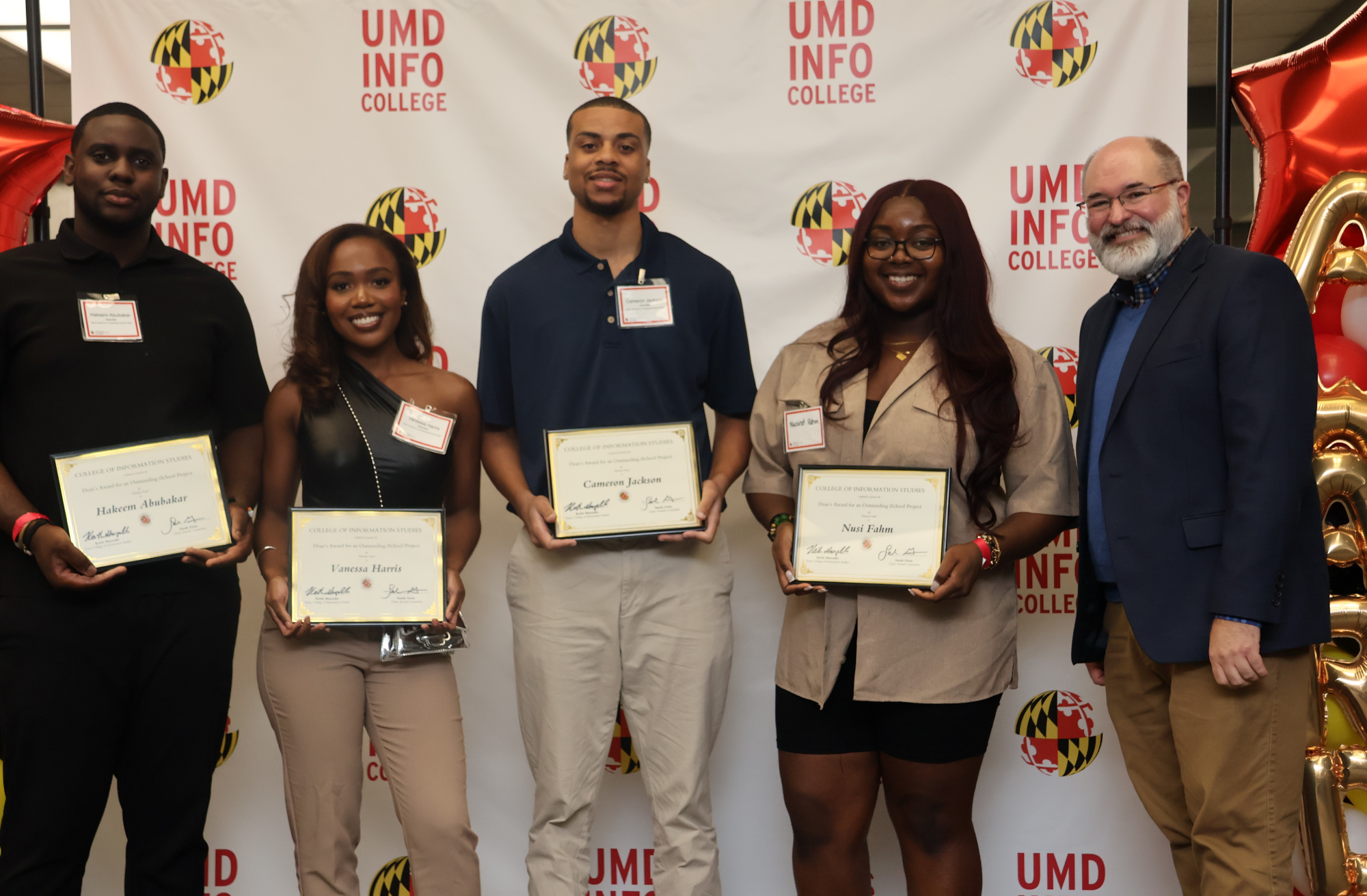 INFO awardees Hakeem Abubakar, Vanessa Harris, Cameron Jackson, Nusi Fahm with INFO Associate Dean for Strategic Initiatives Wayne Lutters - at tehhe 2024 Student Awards Reception