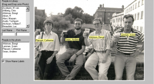 photo of four men with four plastic cups of liquid raised towards the camera within a photo annotation and finder system