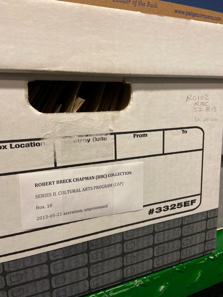 A box of items that reads: "Robert Breck Chapman Collection"