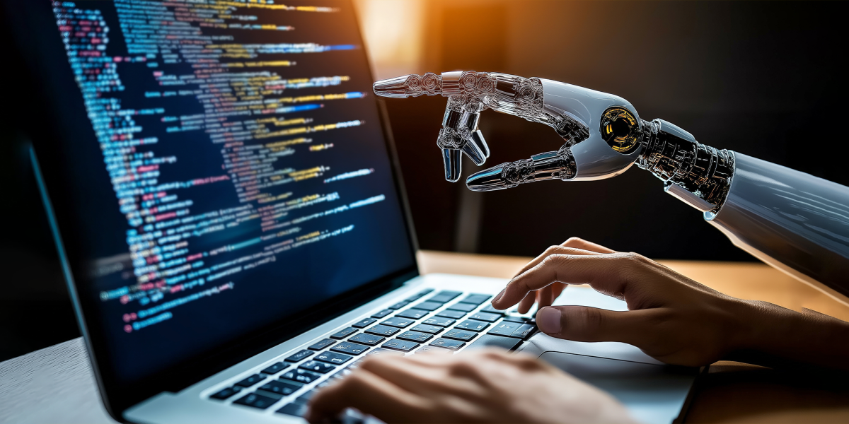 A humanoid AI agent robot helping a human worker with coding at a laptop computer symbolizing agentic autonomy at work and the future of automation in jobs with copilot bots as assistants.