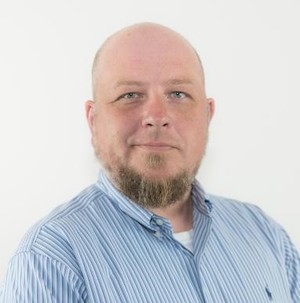 headshot of David (Dave) Baugh